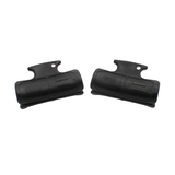 Two black plastic steering clips on a white background
