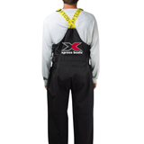 Person wearing black overall bibs from behind, with the Xpress Boats logo on the back. 