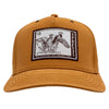 Front of a light brown cap featuring a stamp-like patch containing two ducks in flight and text.