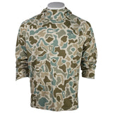Front of a long-sleeve high-collar performance shirt with a multi-color camouflage pattern in beige, olive green, and teal, displayed on a mannequin torso against a white background.